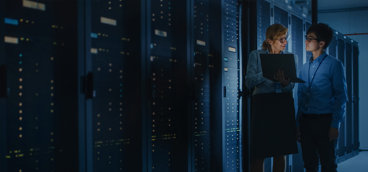 two men in a server room